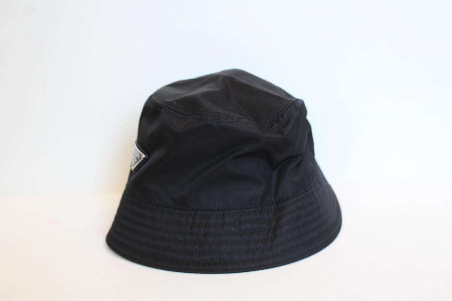 PRADA Men's Black Re Nylon Triangle Enamel Logo Bucket Hat Cap Size XS NEW