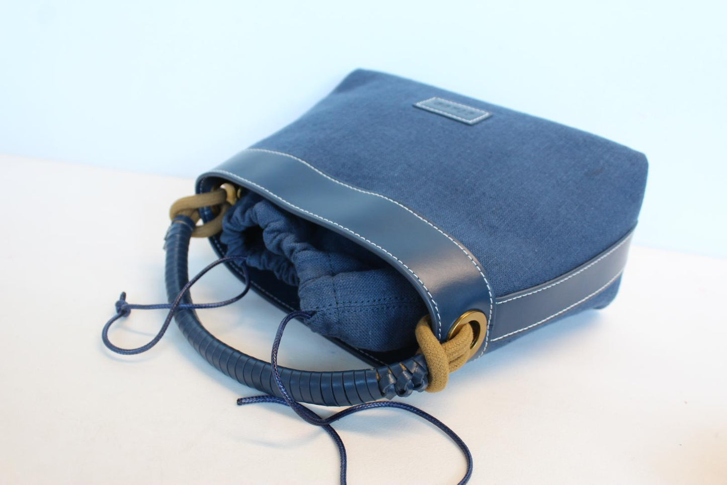 STAUD Ladies Tellie Blue Canvas Top Handle Leather Trim Drawstring Tote Bag NEW
